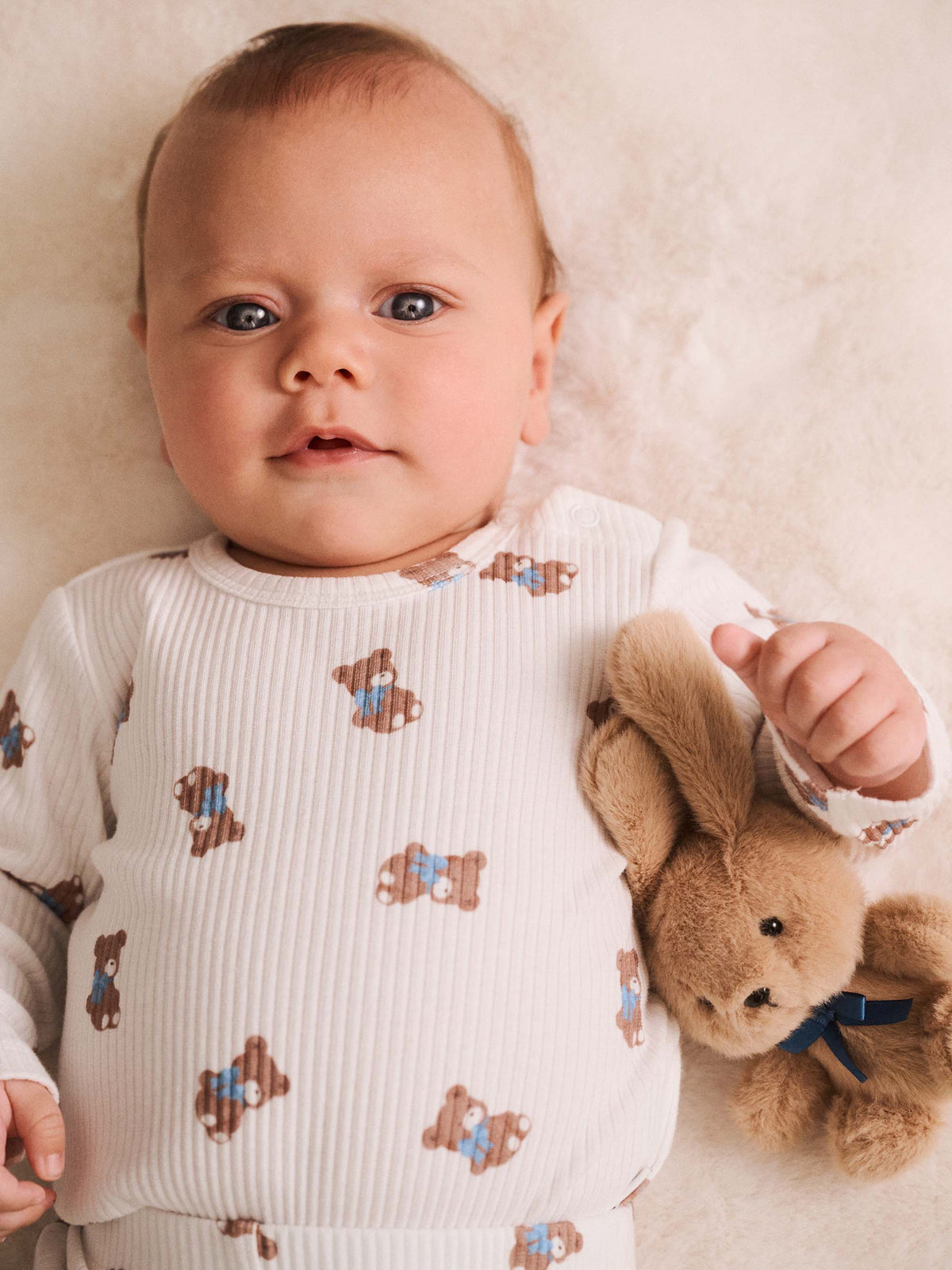 Huxbaby Tumbling Bow Hux Long Sleeve Bodysuit  - Almond Milk / Blue