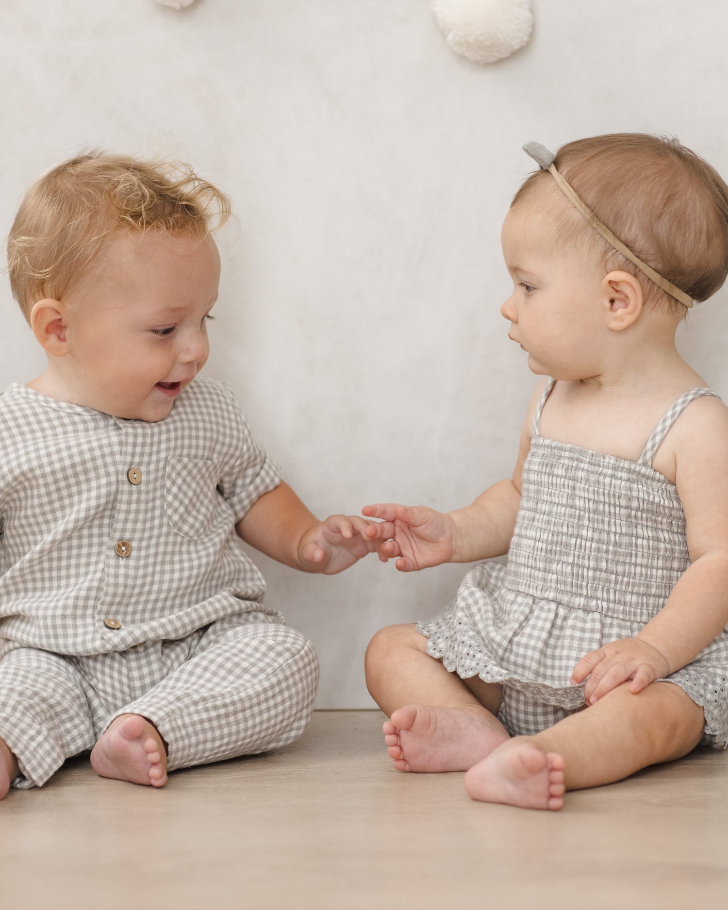 Quincy Mae Smocked Skirted Romper - Sage Gingham