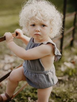 The Simple Folk The Ruffle Romper - Lead Gray